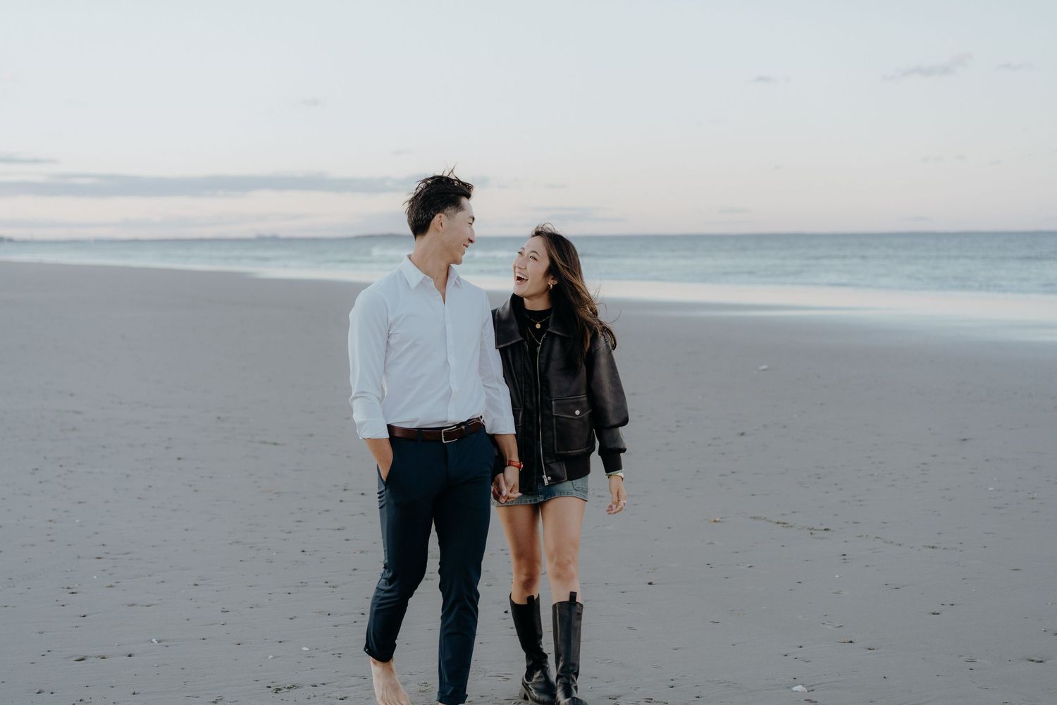 Eric and Emily walking on the beach