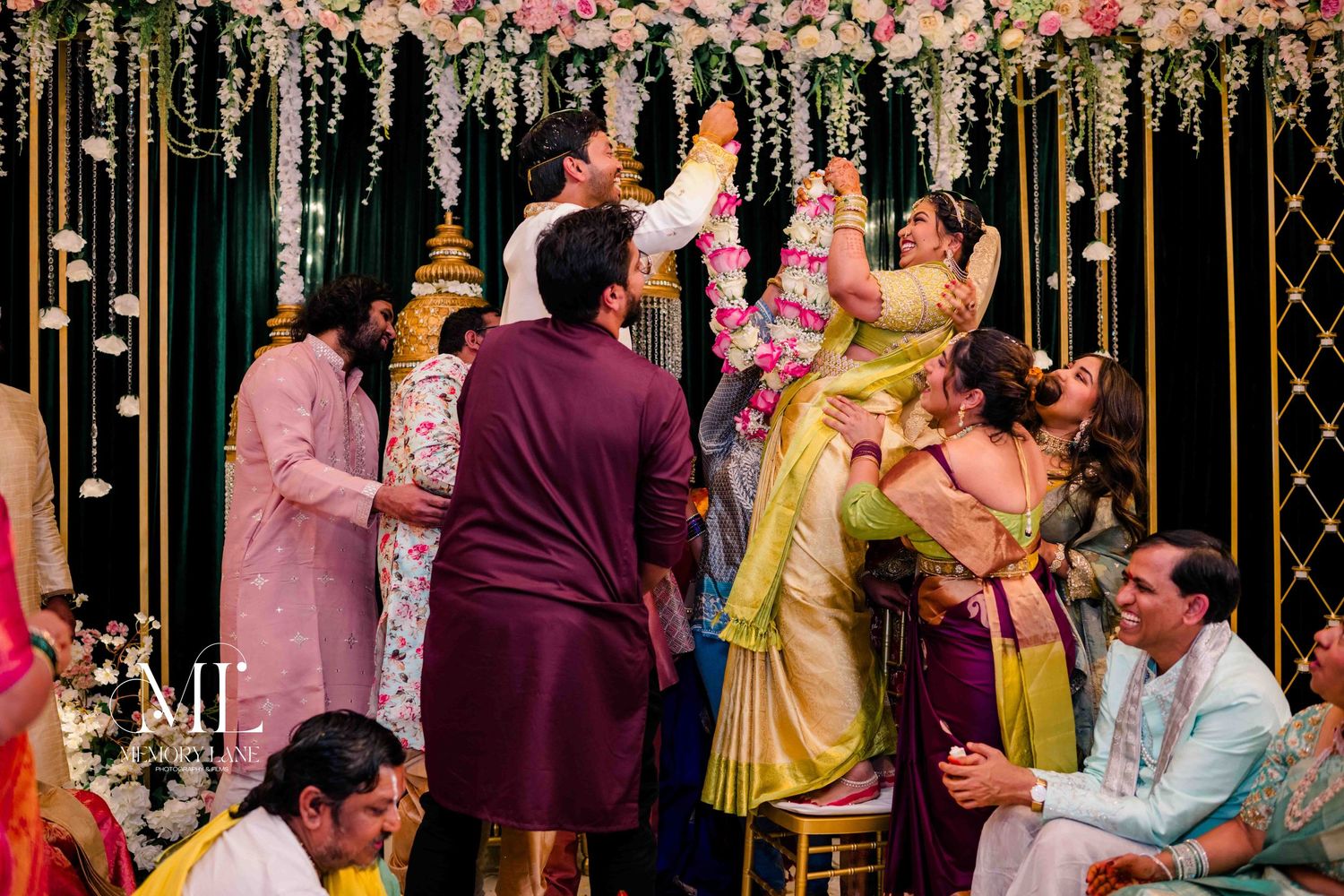Joyful candid moment from Prathyusha & Sachin's wedding – all smiles and laughter as love and happiness fill the air.