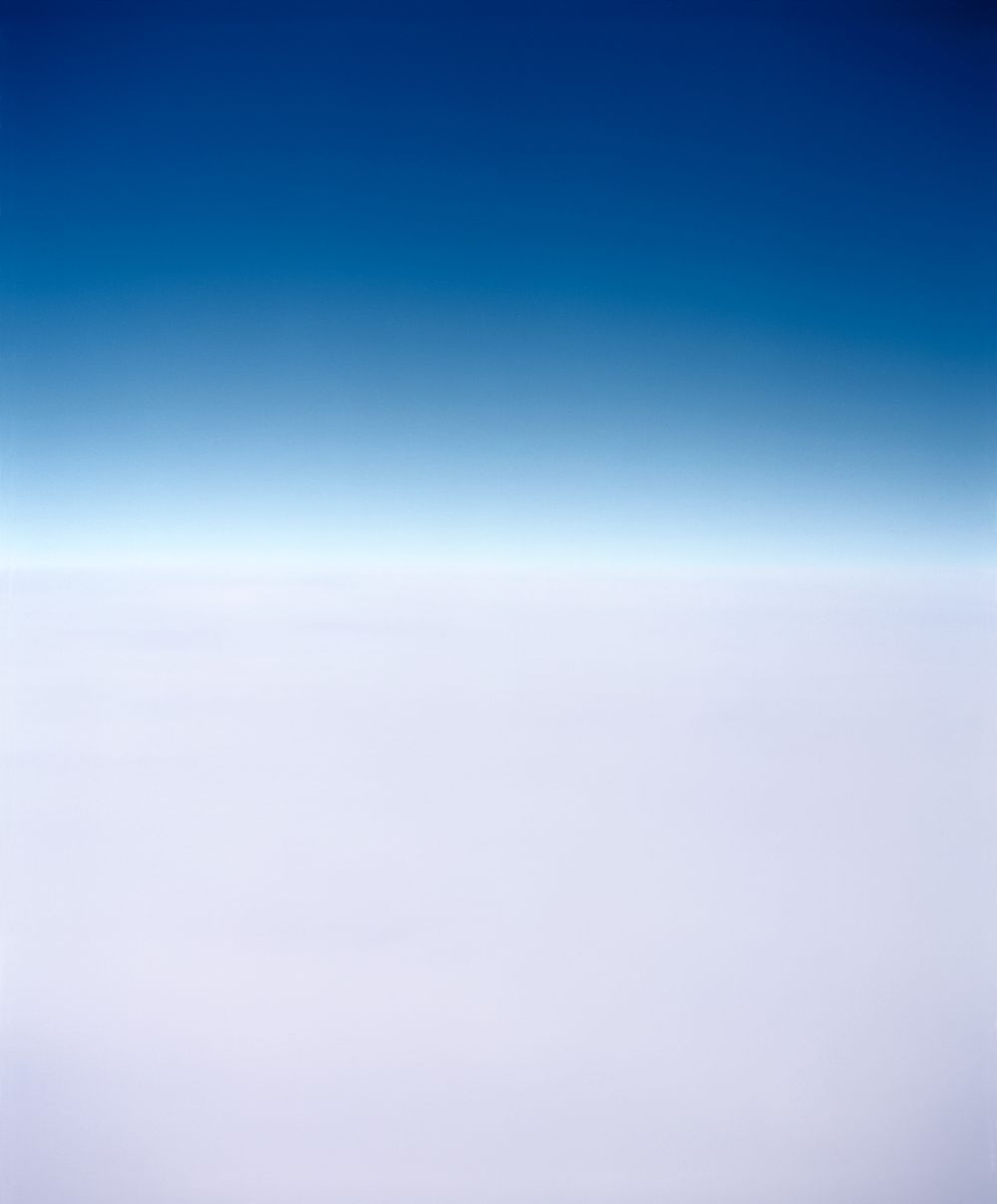 Gradient of deep blue to white creates a simple minimalist sky composition.