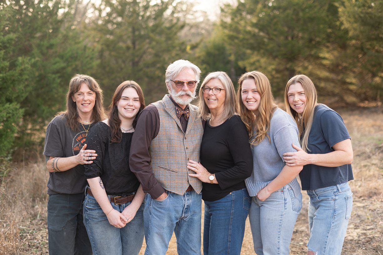 Small Extended Family Session in Winter Field of Evergreens by Bartlesville Family Photographer Kristi Bray