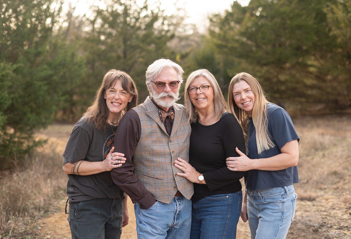 Small Extended Family Session in Winter Field of Evergreens by Bartlesville Family Photographer Kristi Bray