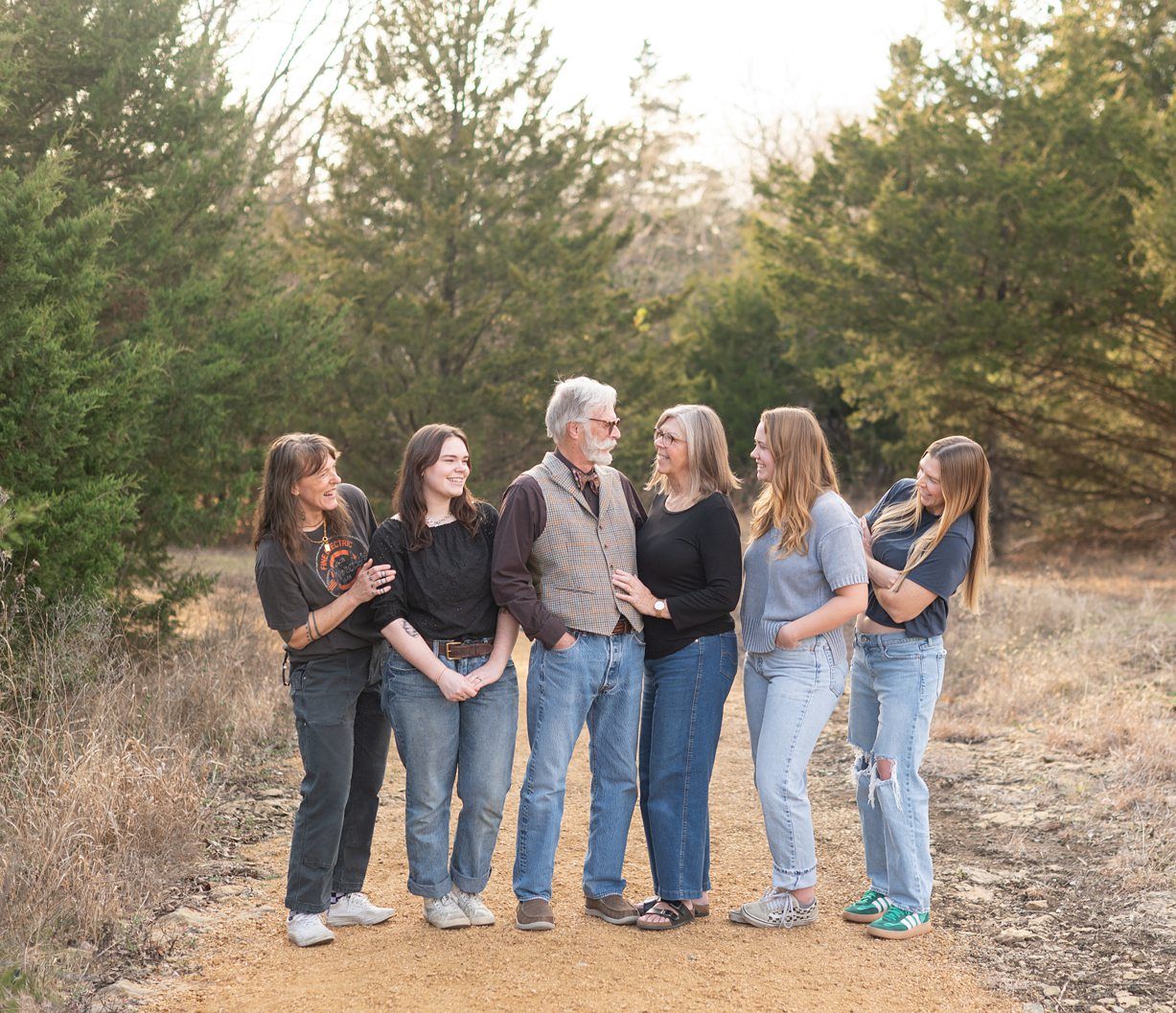 Small Extended Family Session in Winter Field of Evergreens by Bartlesville Family Photographer Kristi Bray