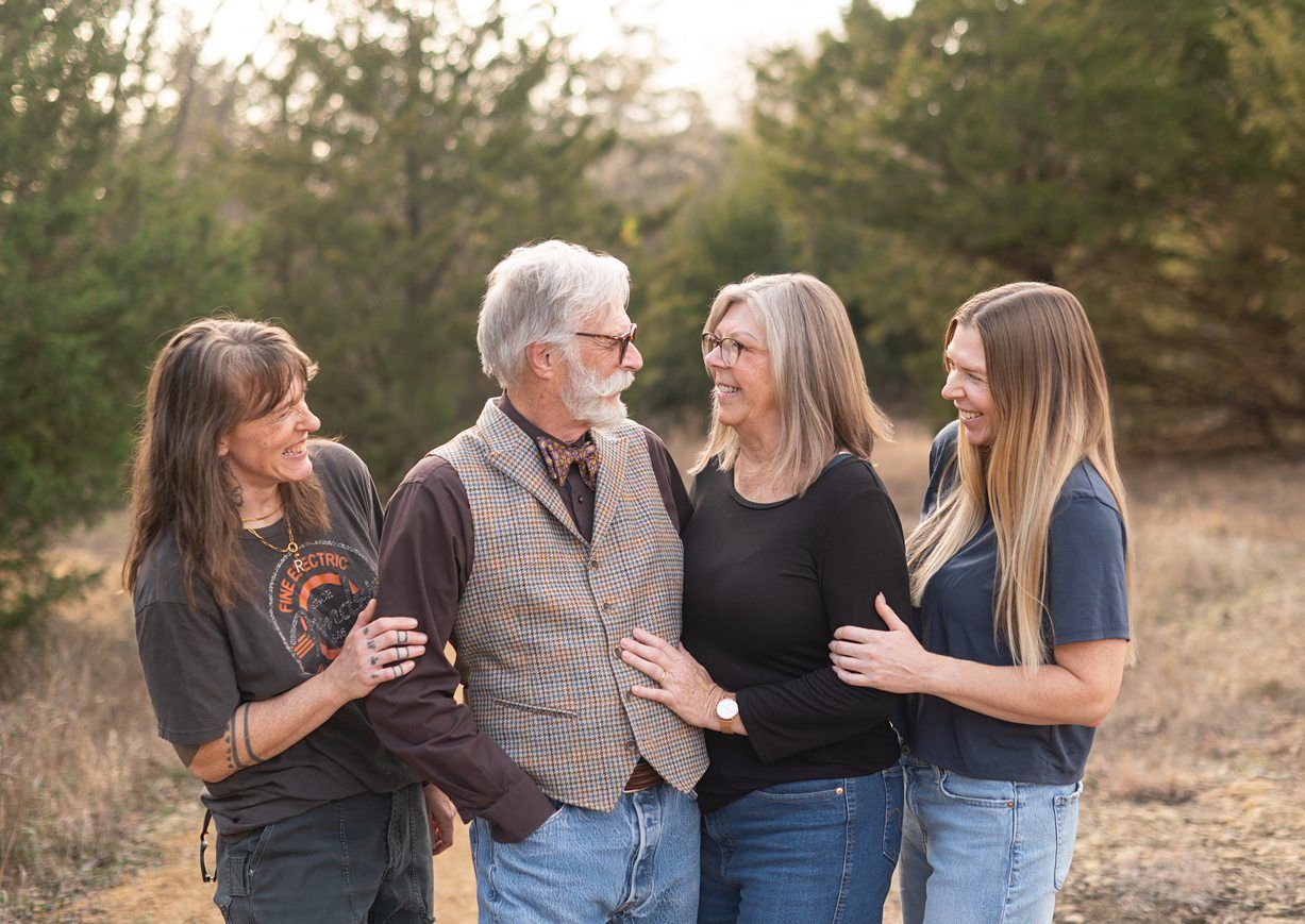 Small Extended Family Session in Winter Field of Evergreens by Bartlesville Family Photographer Kristi Bray