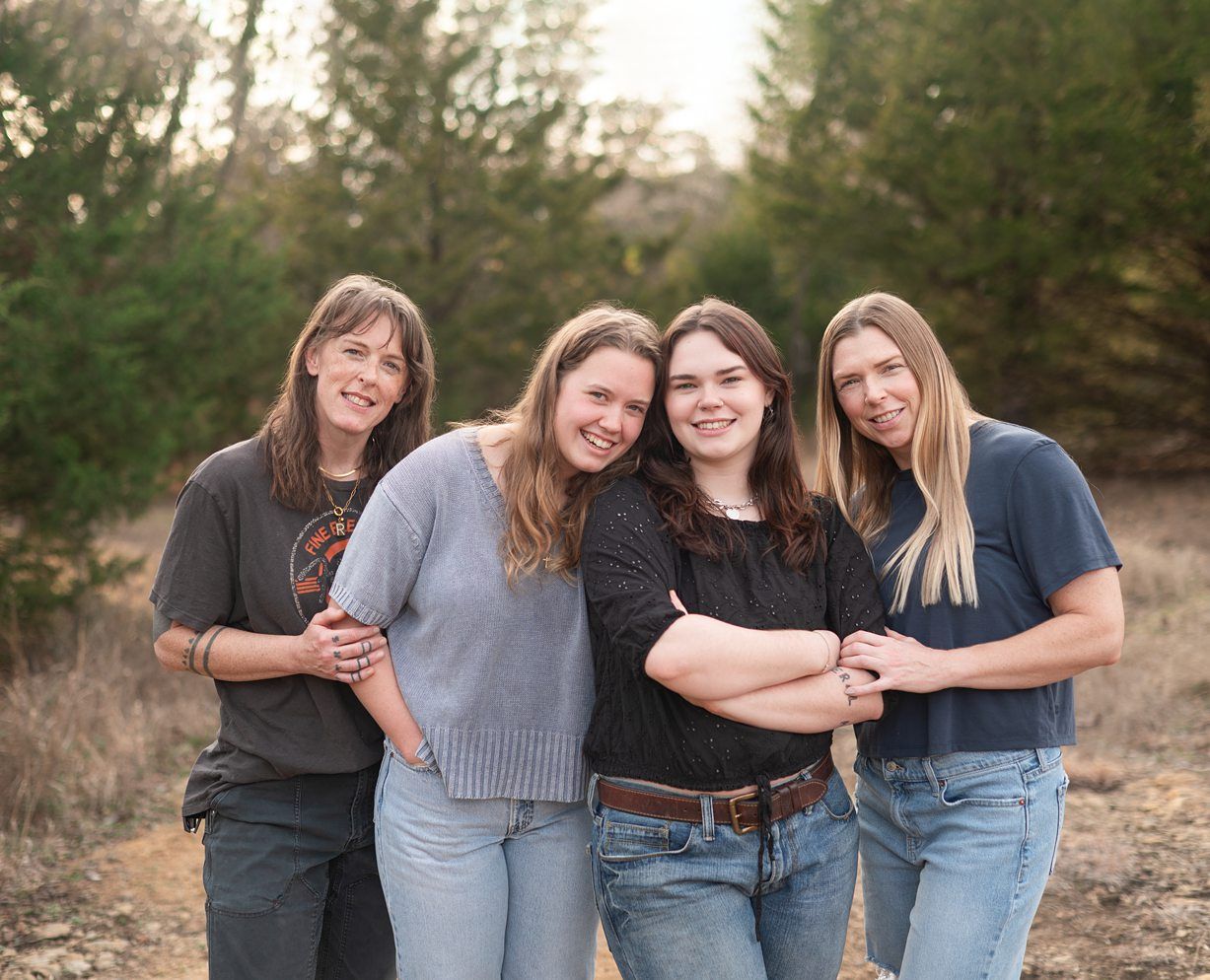Small Extended Family Session in Winter Field of Evergreens by Bartlesville Family Photographer Kristi Bray
