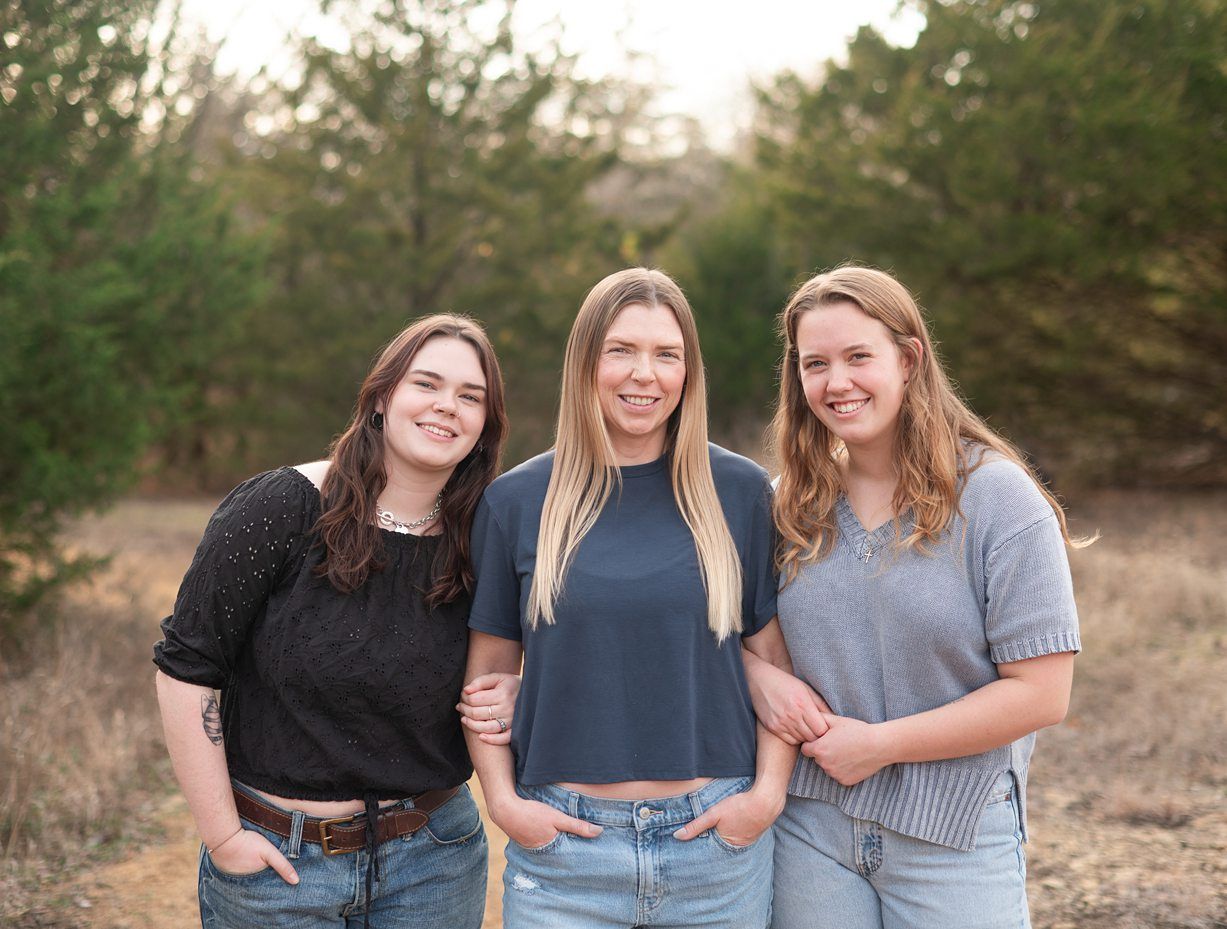 Small Extended Family Session in Winter Field of Evergreens by Bartlesville Family Photographer Kristi Bray