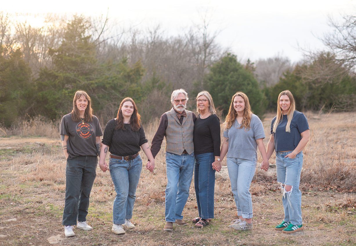 Small Extended Family Session in Winter Field of Evergreens by Bartlesville Family Photographer Kristi Bray