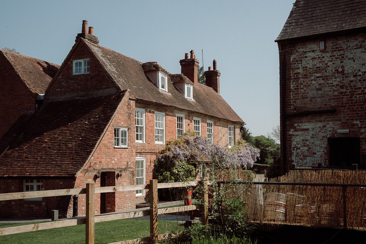 Historic red brick Old Mill at Aldermaston.