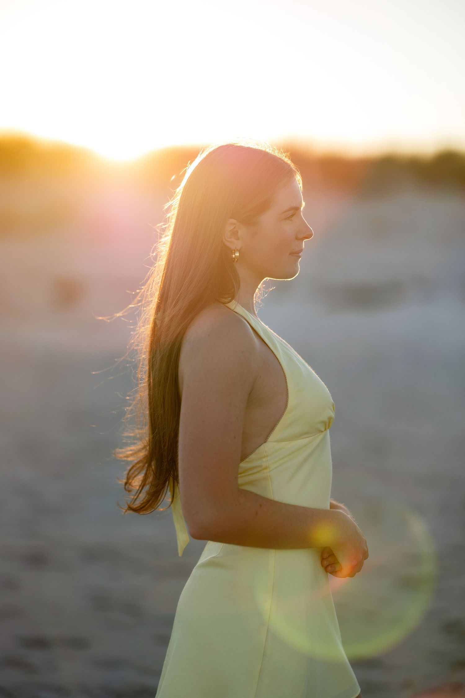 High school senior portrait at sunset on Hampton Beach NH