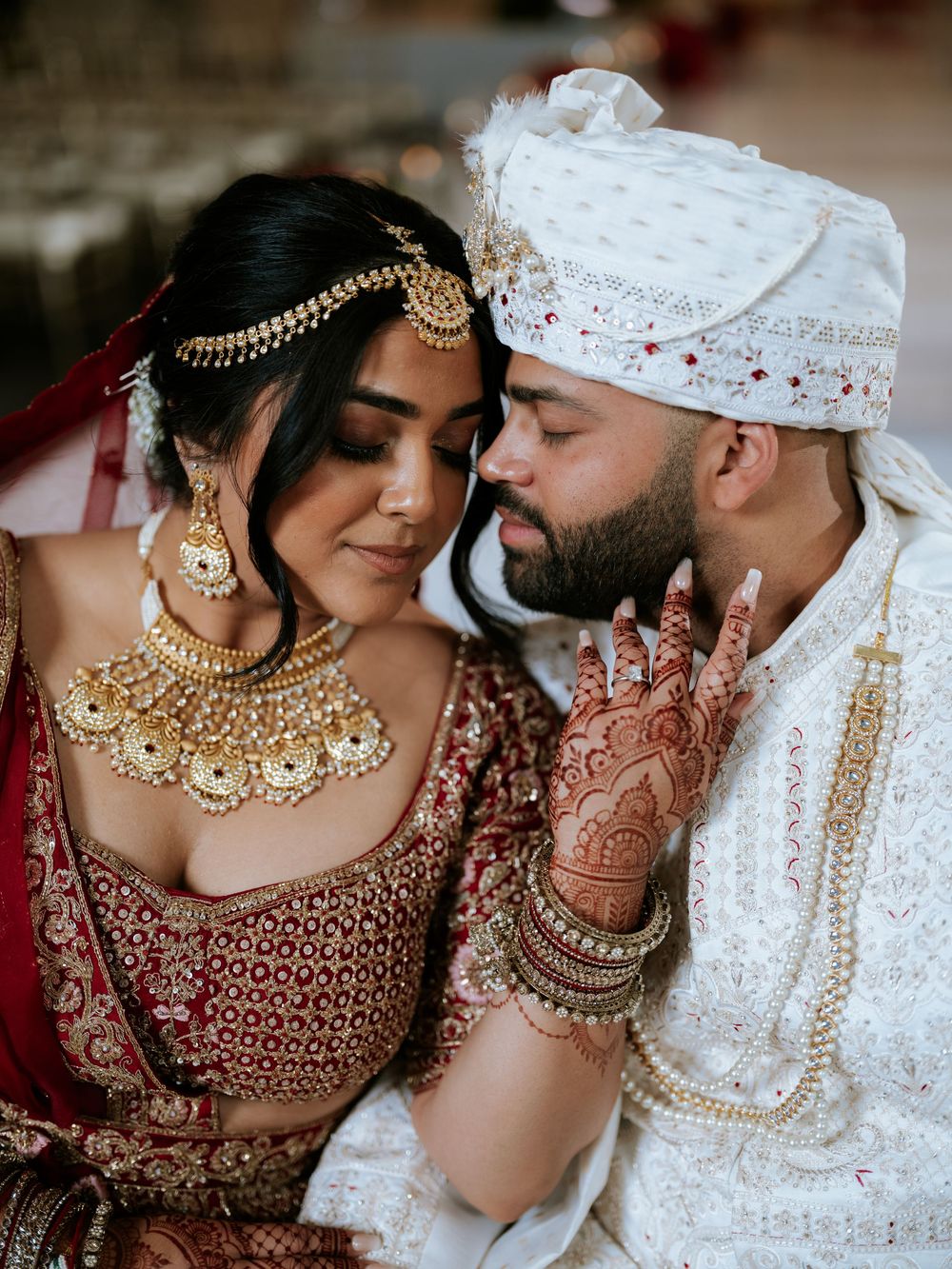 A romantic collection of South Asian wedding photos showing couples in traditional bridal attire with ornate jewelry and details.