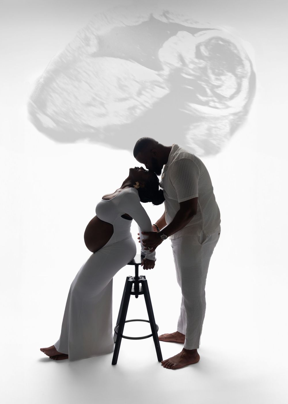 A series of silhouettes showing a hairdressing scene with two figures at a salon chair against a white background.