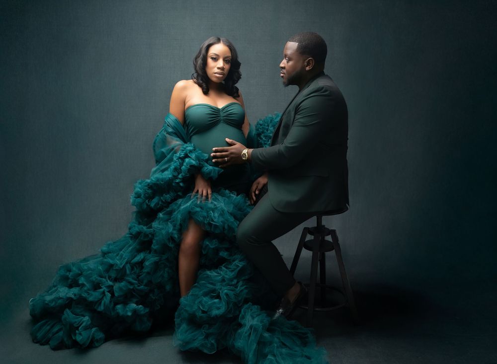 A romantic photoshoot series featuring a couple in formal wear with a dramatic teal tulle gown against a dark background.