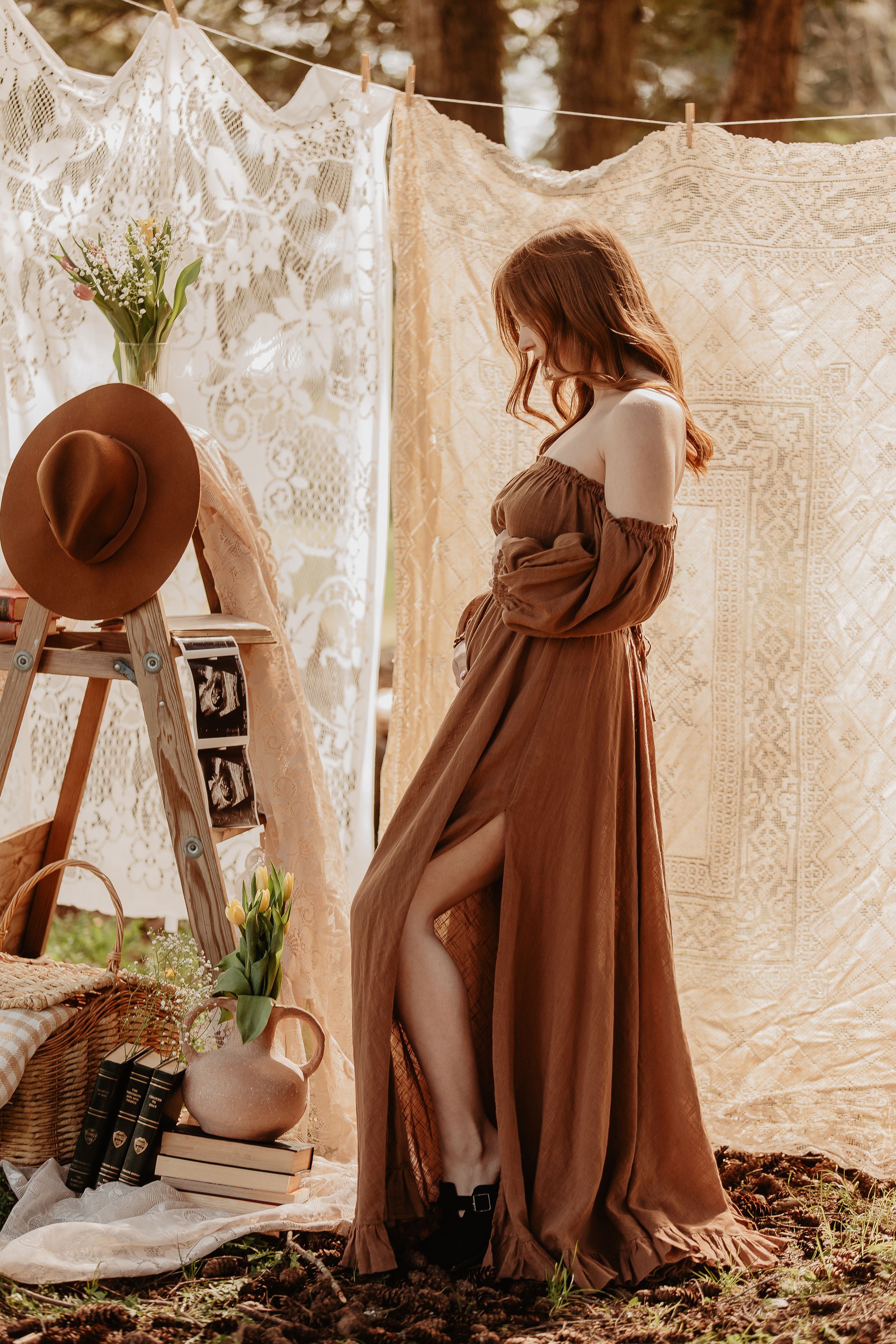 A series of vintage-inspired sepia photographs showing a brown dress and hat against lace curtains in a dreamy setting.