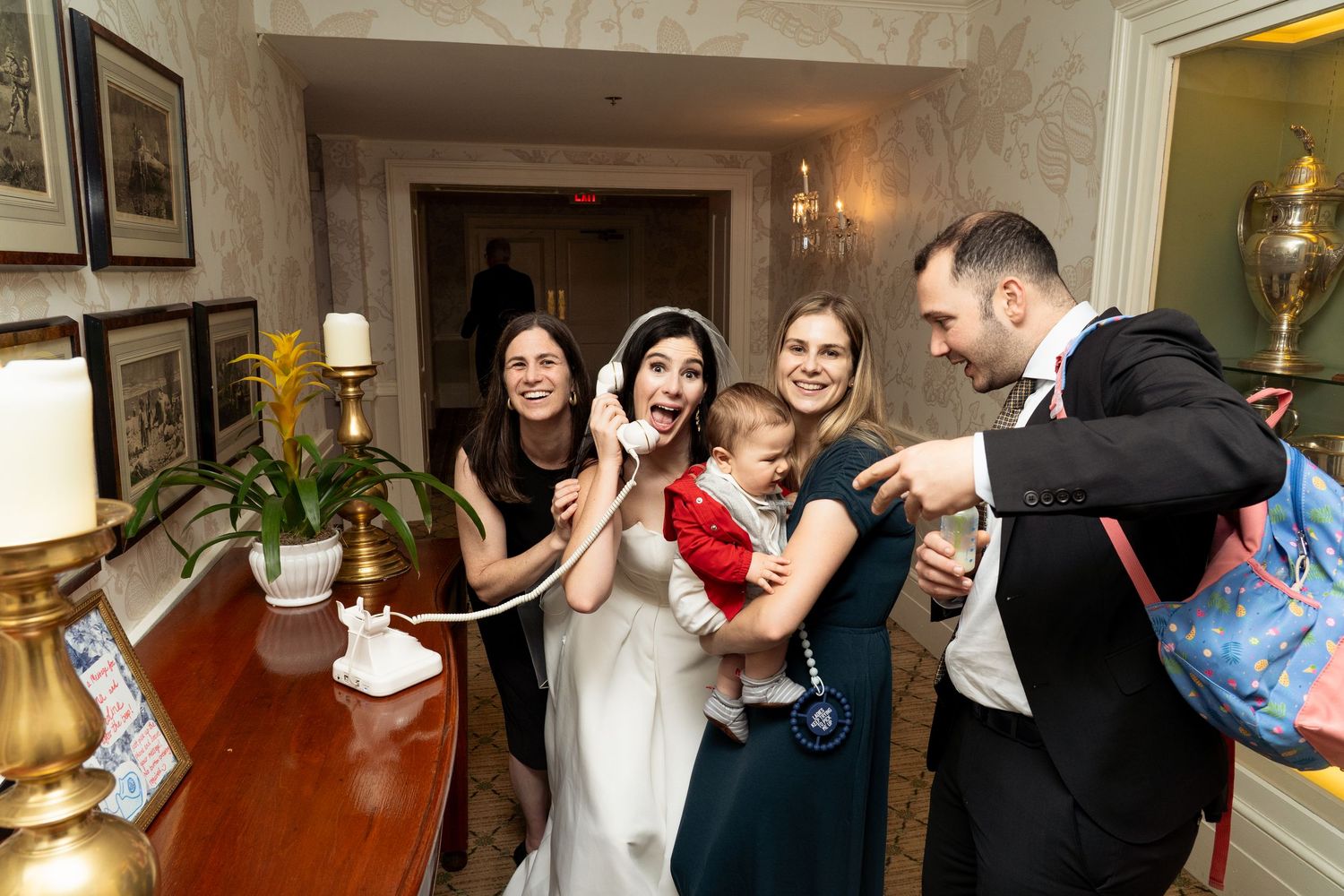Candid bridal portrait with bride on the phone