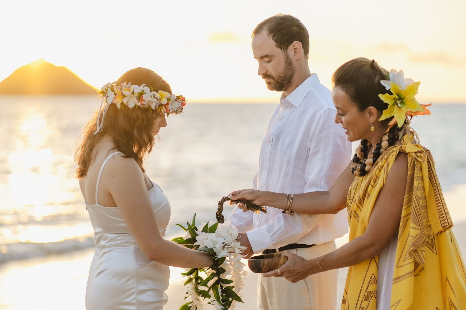 Sunrise elopement at Kailua Oahu Hawaii                         Officiant Kelehua Marry me hawaii