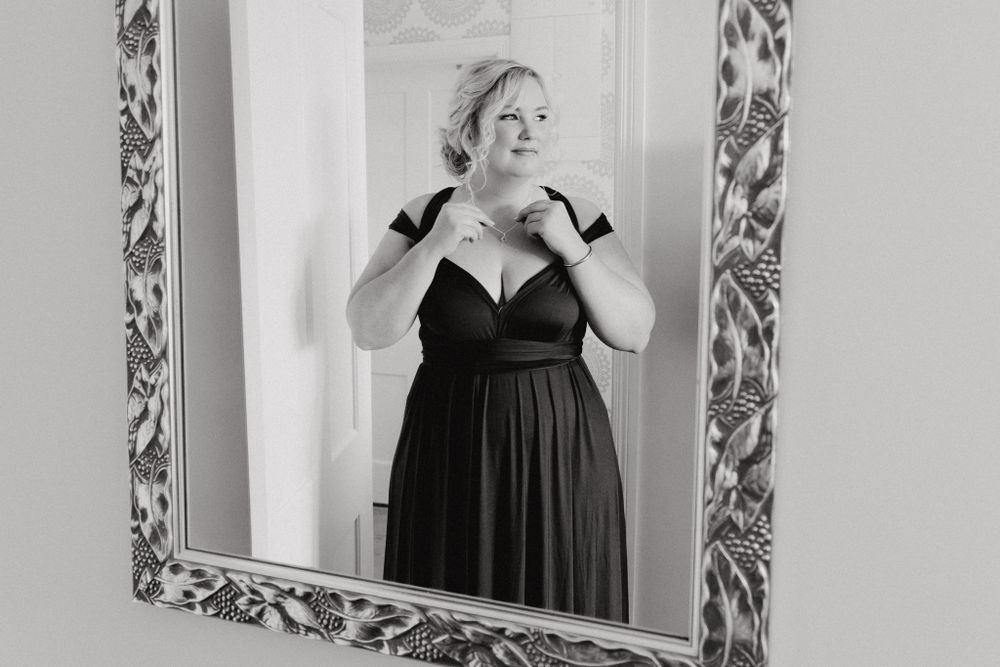 Black and white portrait of a bridesmaid, captured by Apertured Media Auckland Wed