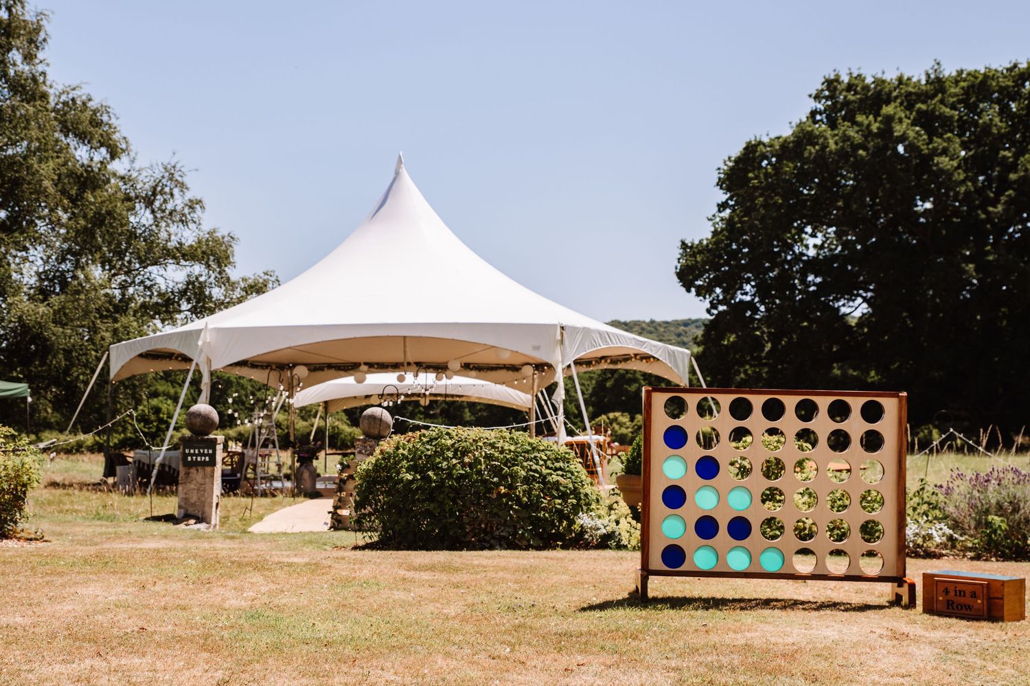 Dorset candid wedding photographer. Marquee Dorset. Dorset outdoor wedding. Garden game hire Dorset. Wedding game hire. Vintage games.