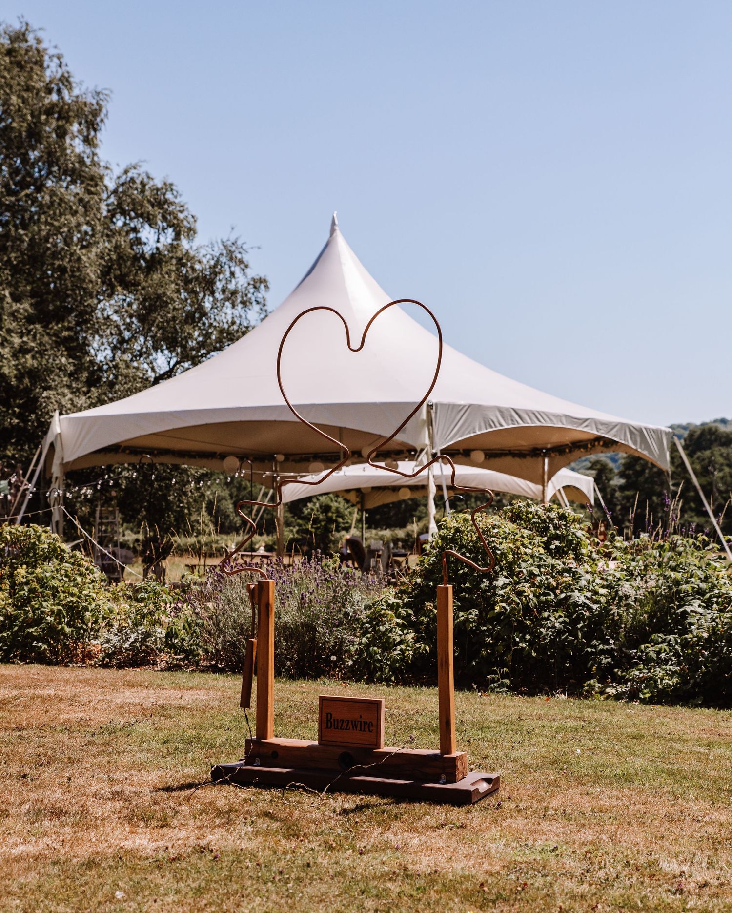 Dorset candid wedding photographer. Marquee Dorset. Dorset outdoor wedding. Garden game hire Dorset. Wedding game hire. Vintage games.