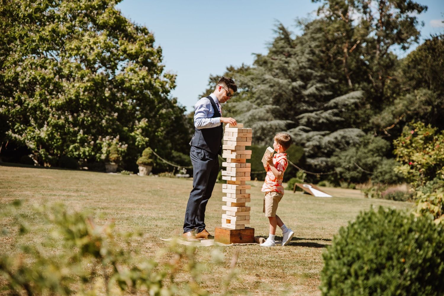 Dorset candid wedding photographer. Marquee Dorset. Dorset outdoor wedding. Garden game hire Dorset. Wedding game hire. Vintage games.