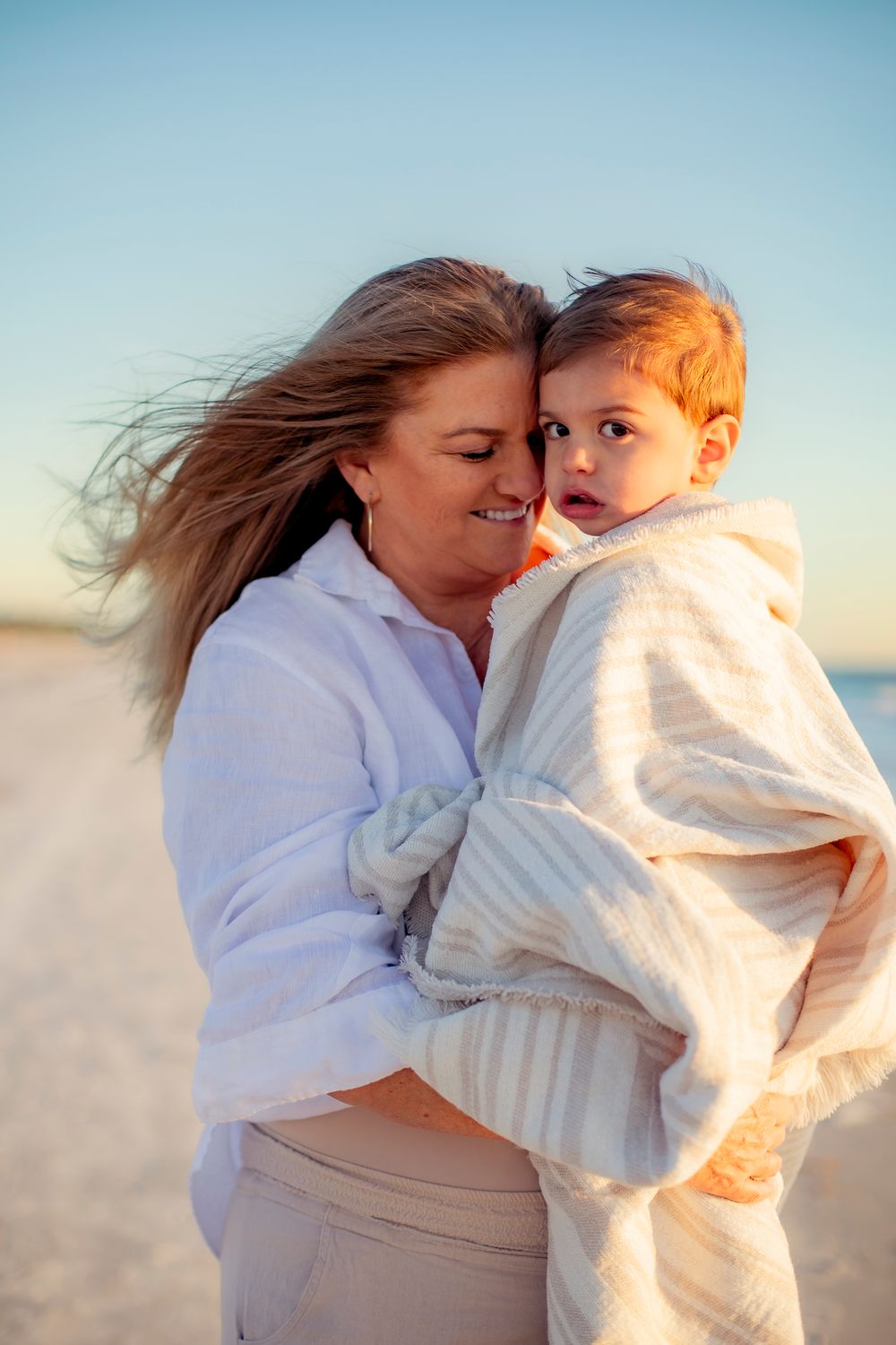 mother and son family photographer st pete beach sunset photos