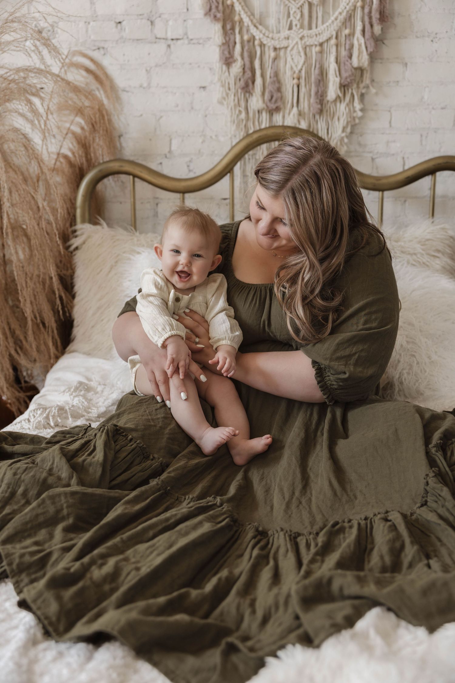 Mommy and me photography session in Minot North Dakota featuring boho setup and client closet dress Minot, ND photographer