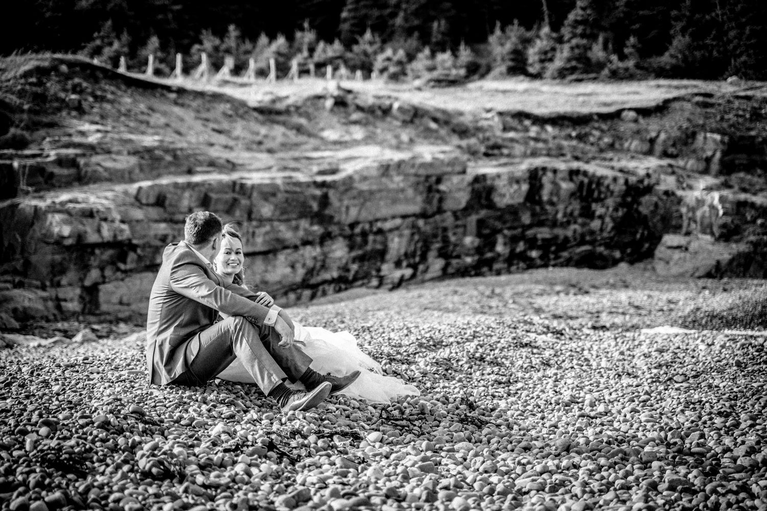 Middle Cove engagement pre-wedding photo of an international couple on the beach.