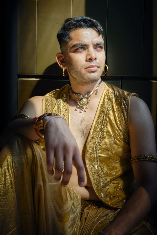 A dramatic portrait series showing someone in a shimmering gold vest against a dark background.