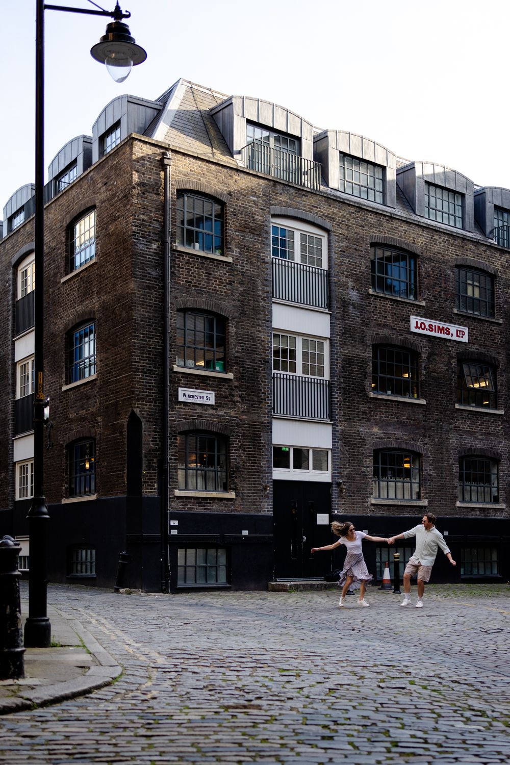 Engaged couple in Borough market, London