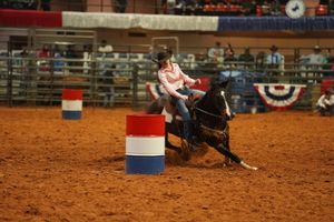 Competitive barrel racing sequence showing horse and rider turning around barrels.