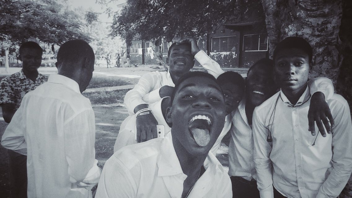 A group of high schoolers having a playful day out