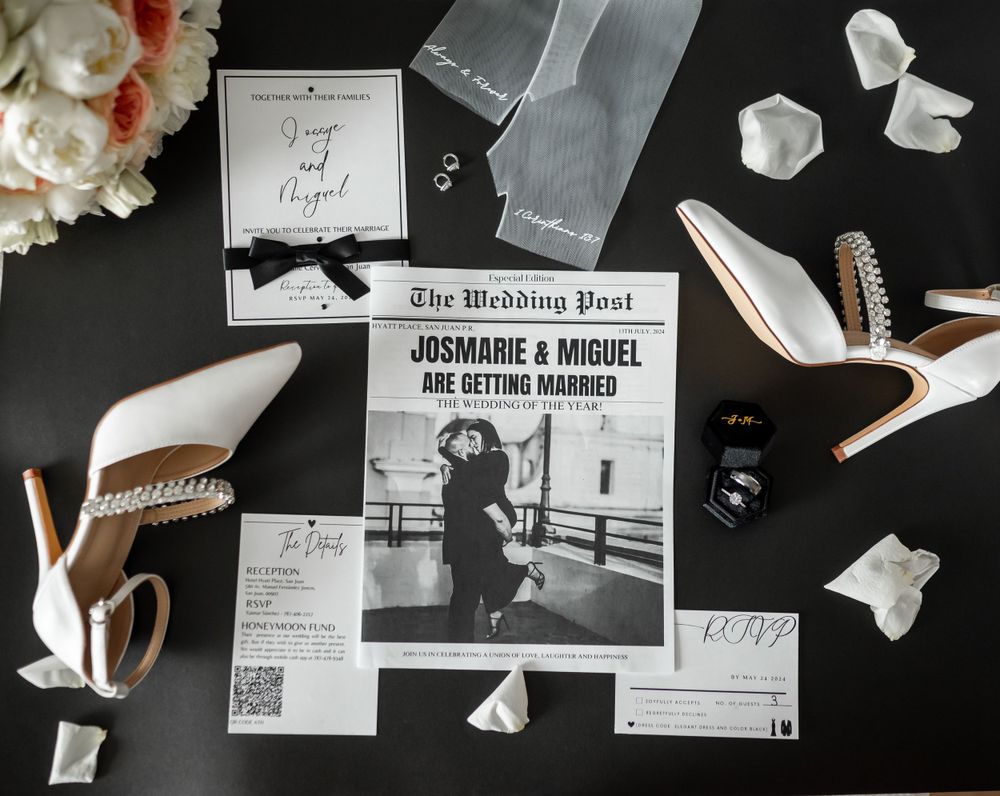 Wedding day details including shoes, jewelry, and newspaper clippings on dark background.