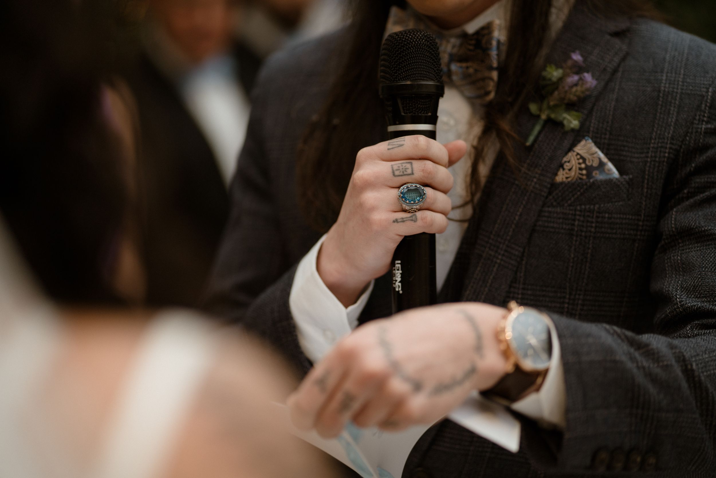 Emotional wedding ceremony moment between couple exchanging vows.