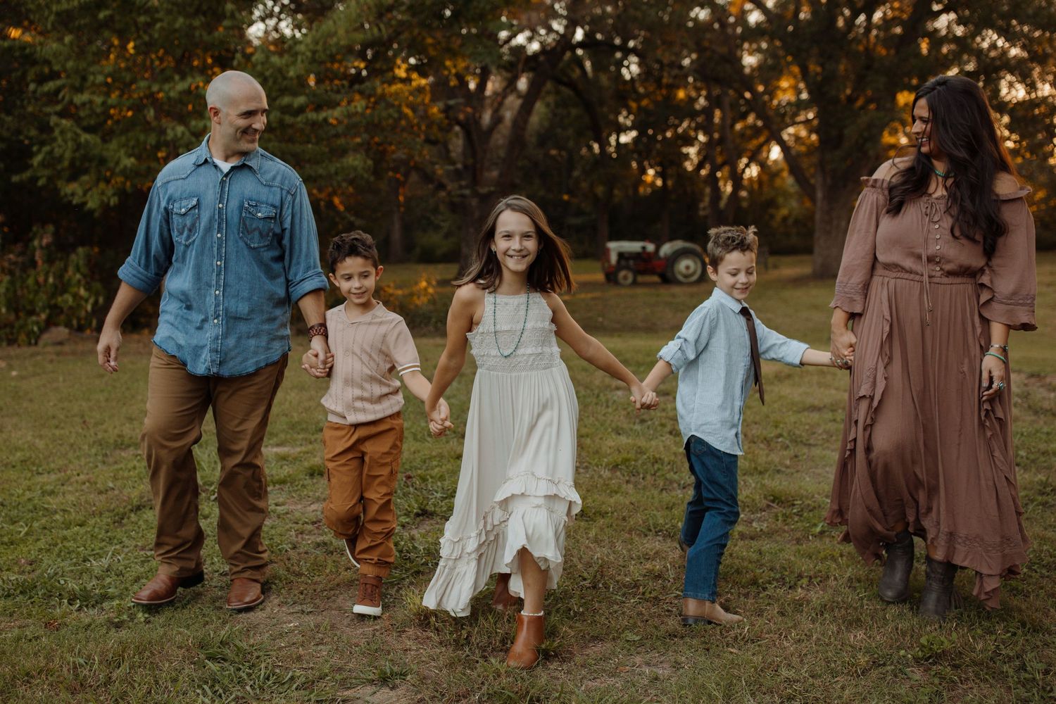 A series of warm-toned photos showing people walking together outdoors during golden hour in autumn.