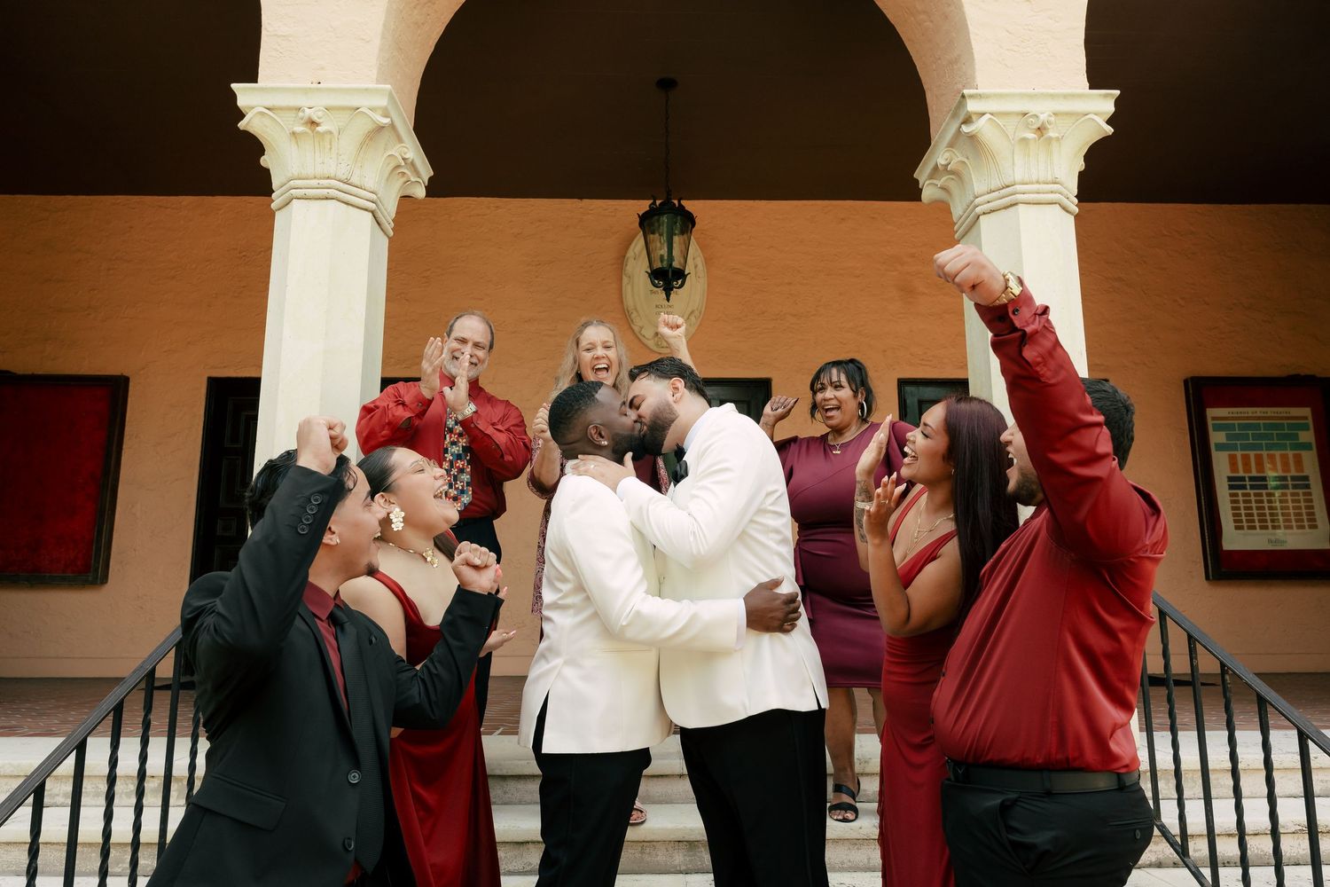 photo of the groom and bride with some tall trees in the background