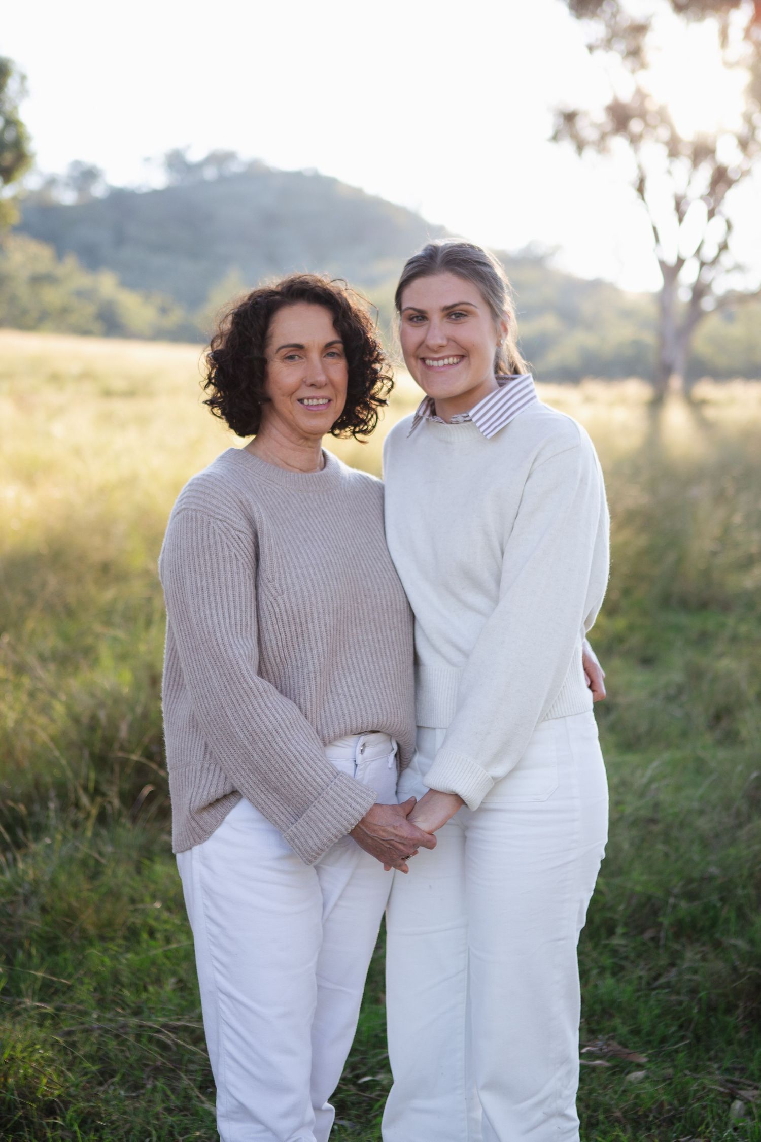 Mum and daughter holding hands during Scone Family Photoshoot