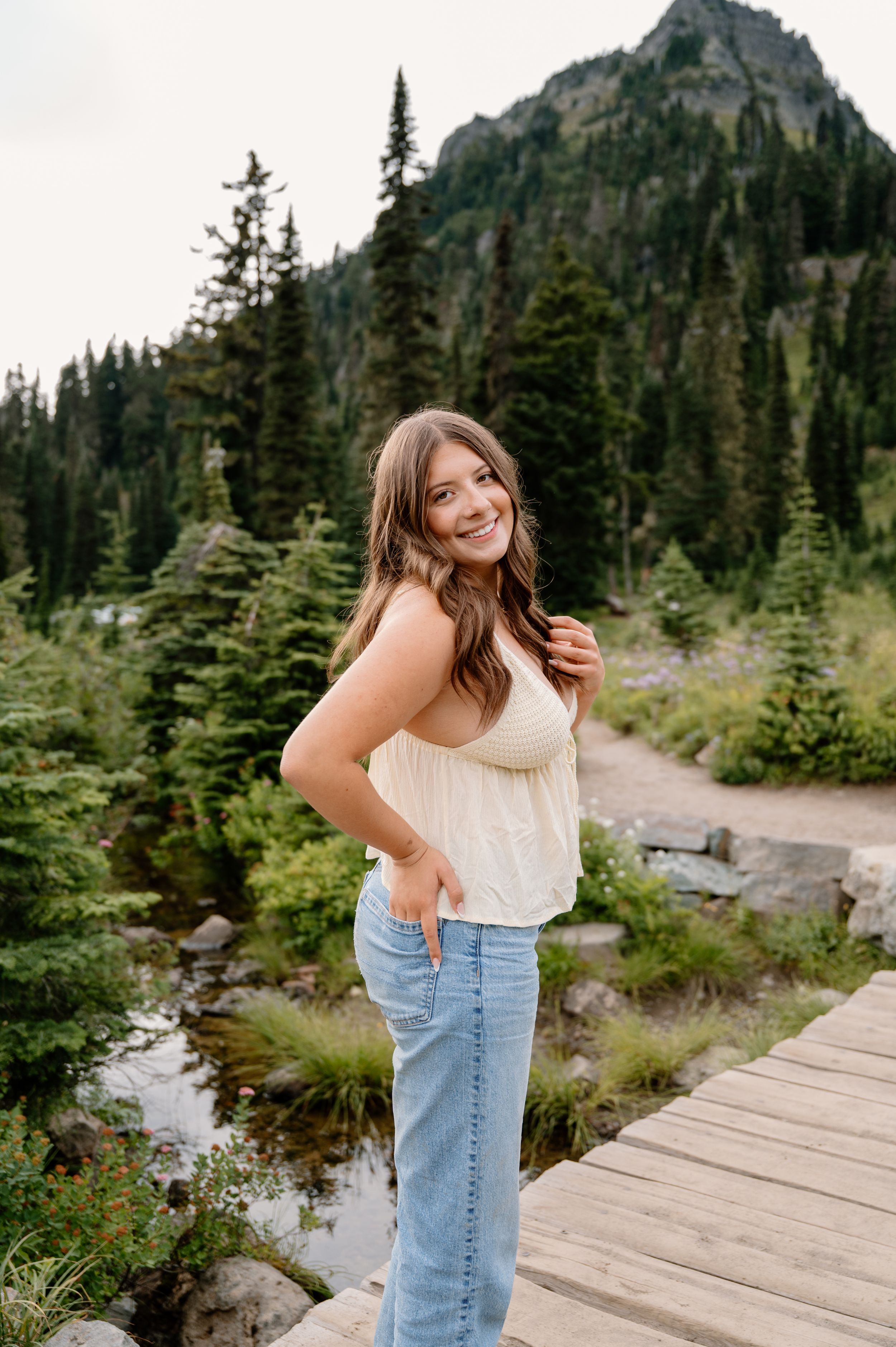 Walla Walla senior sits in a canola field for a senior session