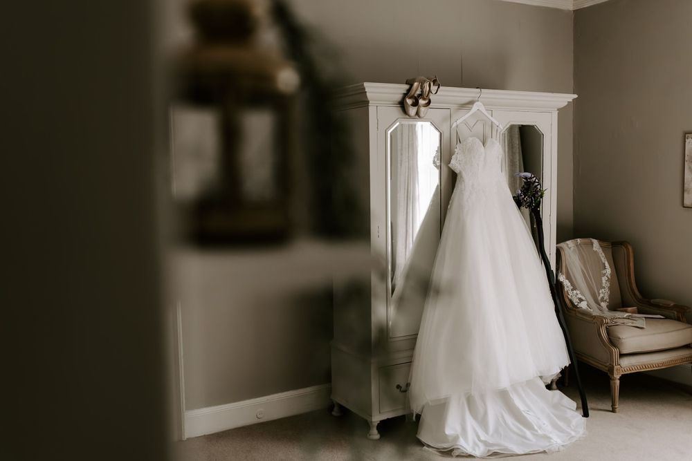 wedding dress hung up