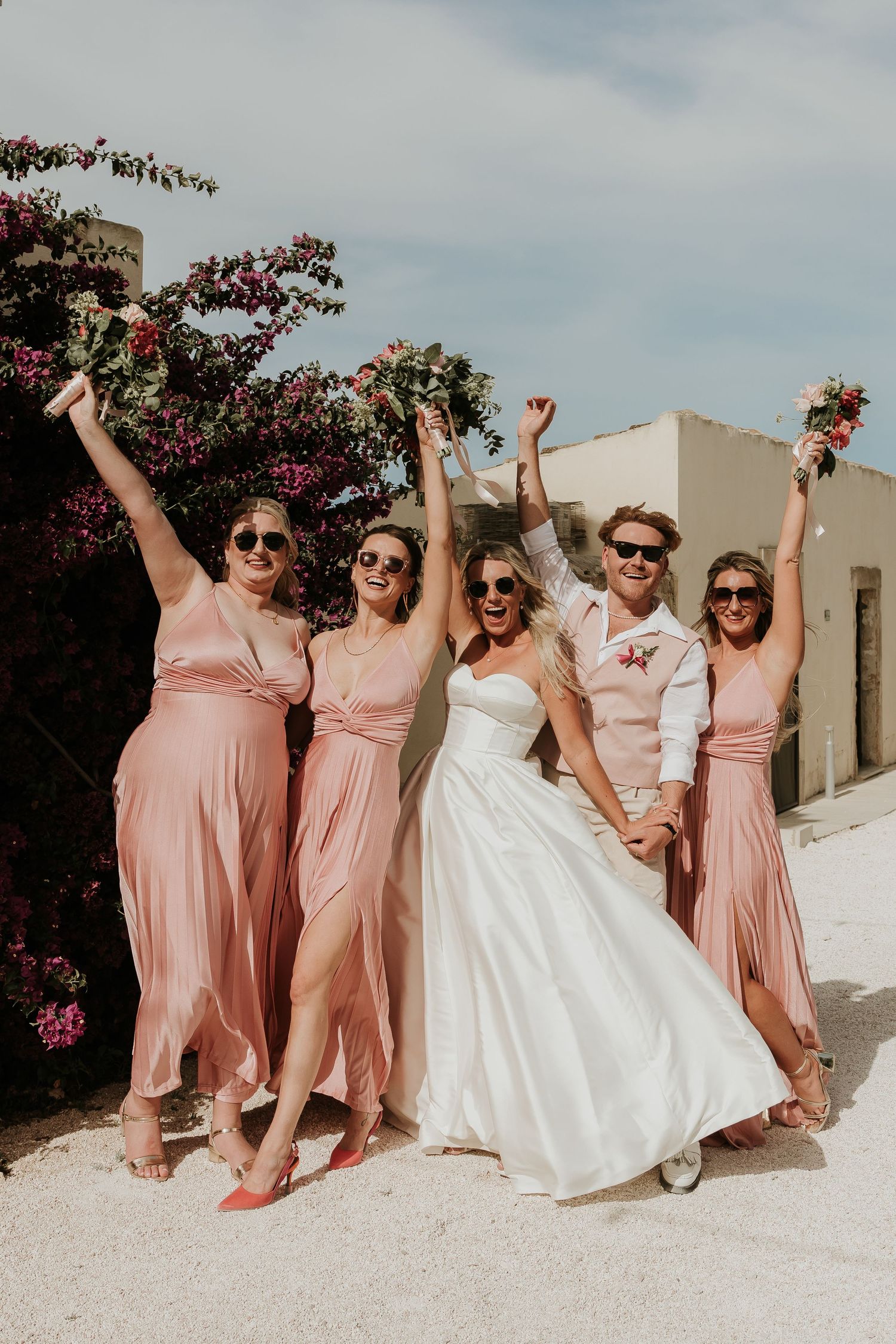 Fun bridesmaid and bride group photograph. Taormina Sicily wedding. Sicilian vineyard wedding