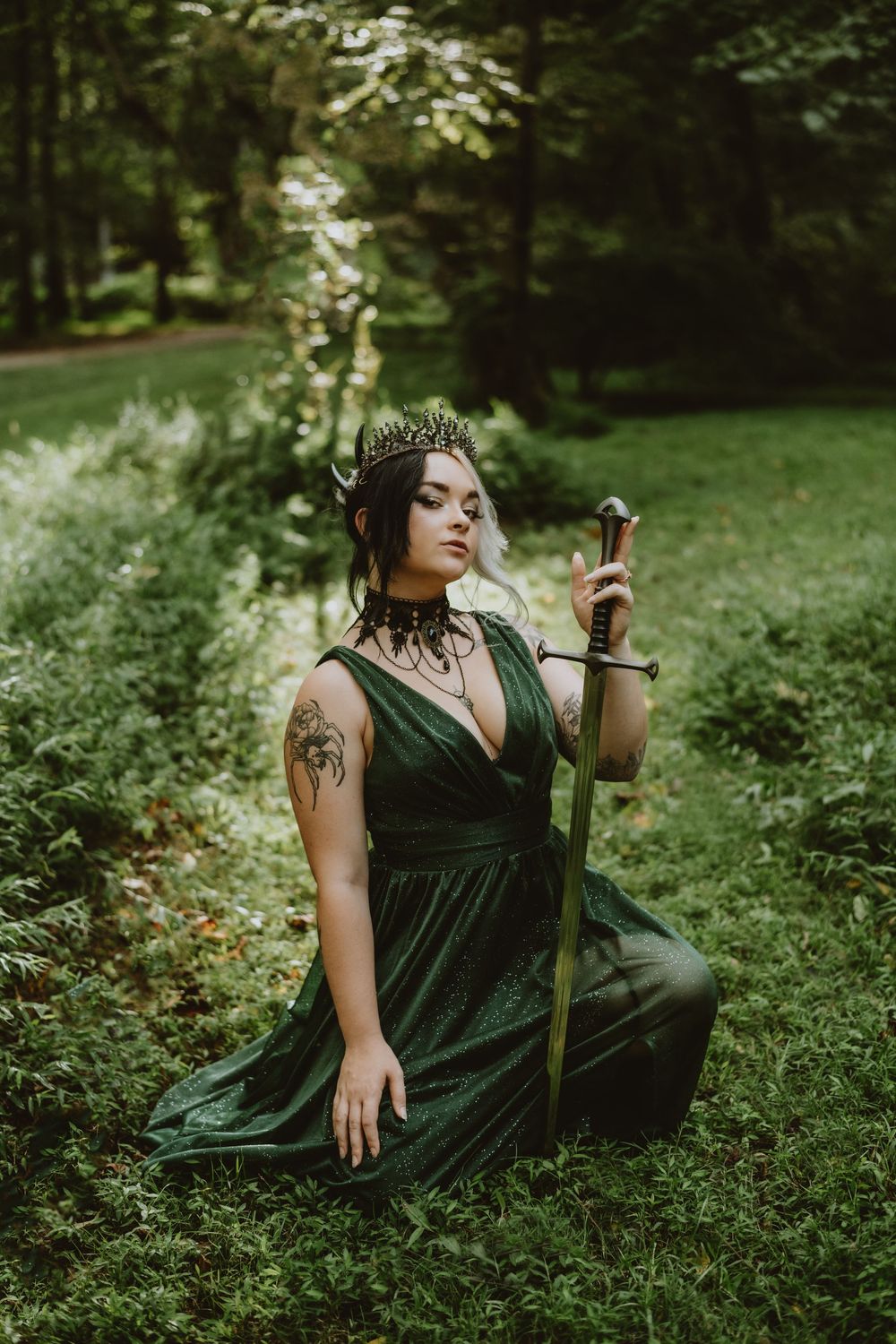 Creative poisoned apple photoshoot with models in dark costumes and cauldron smoke, Asheville, North Carolina.
