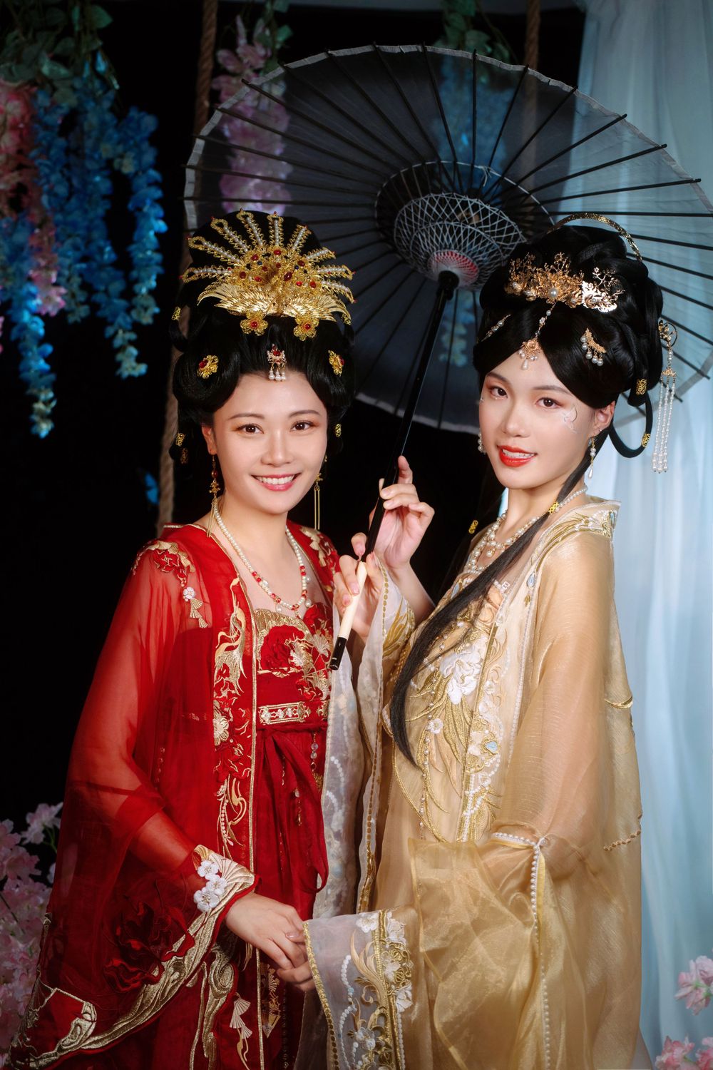 Elegant backlit studio portrait of mother and daughter in Tang Dynasty Hanfu on a swing among wisteria, by Imagine Image Studio.