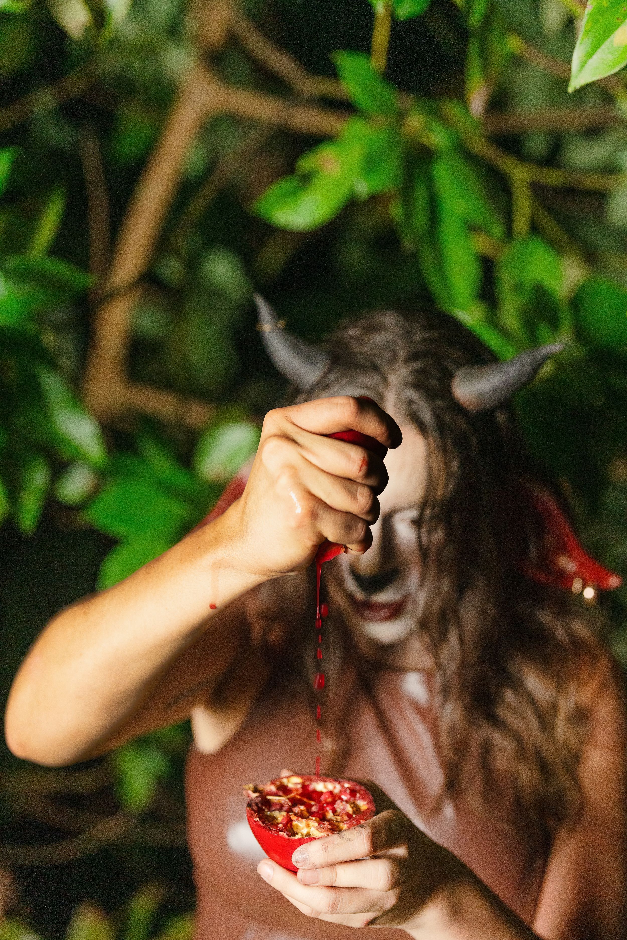 Deer creature sfx makeup with liquor bottle PAMA in the plants