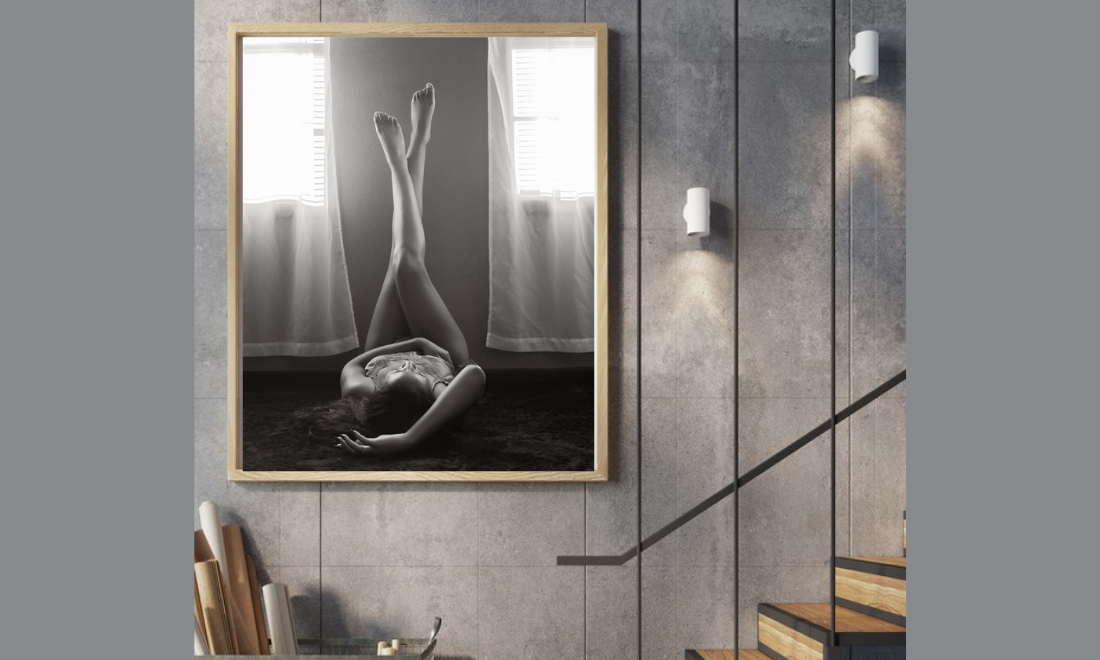 Black and white artistic boudoir photograph showing delicate lace lingerie details against white bedding wall art print artwork