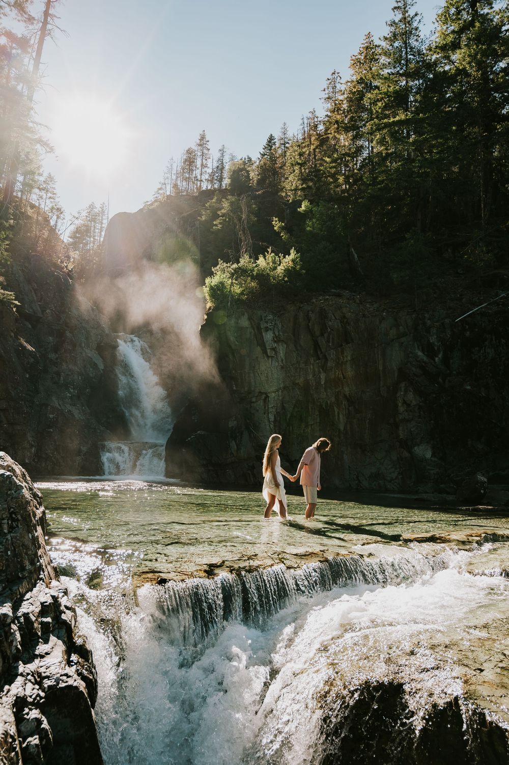 Couple adventure photography photoshoot on Vancouver Island of couple exploring water falls in Strathcona
