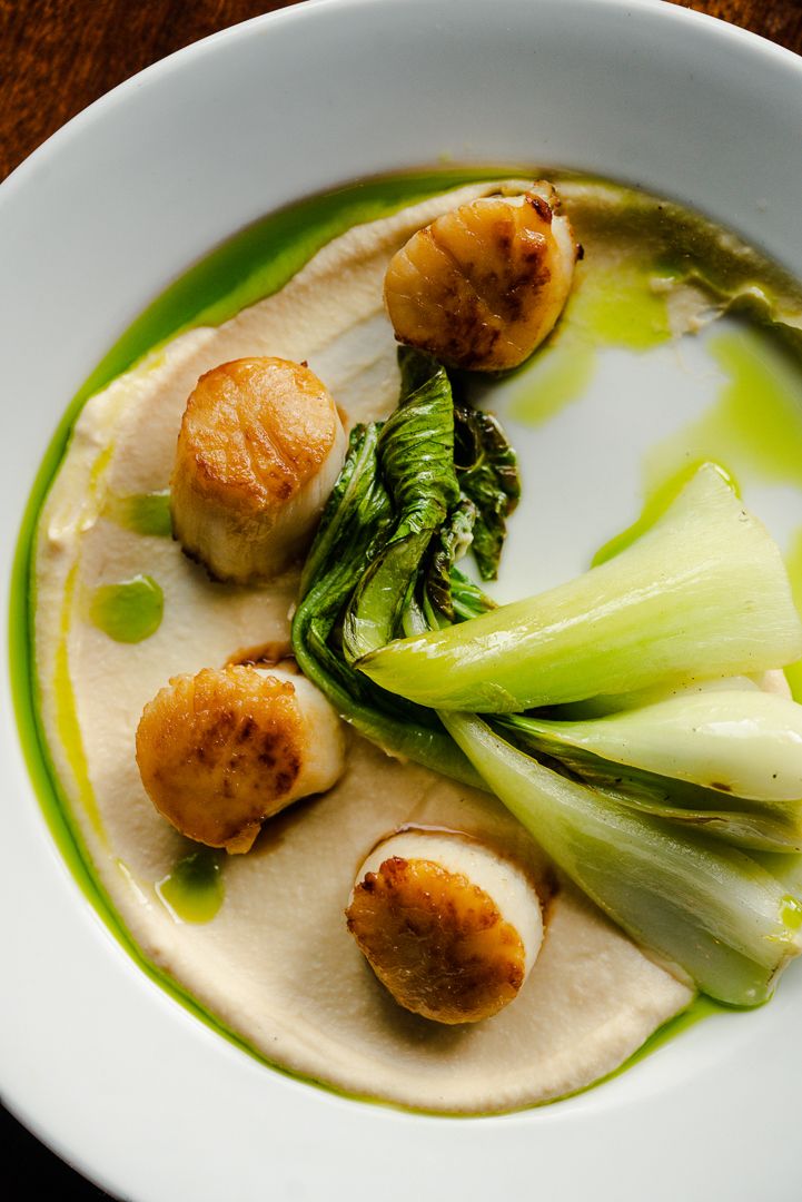 Pan-seared scallops with baby bok choy, food photography.