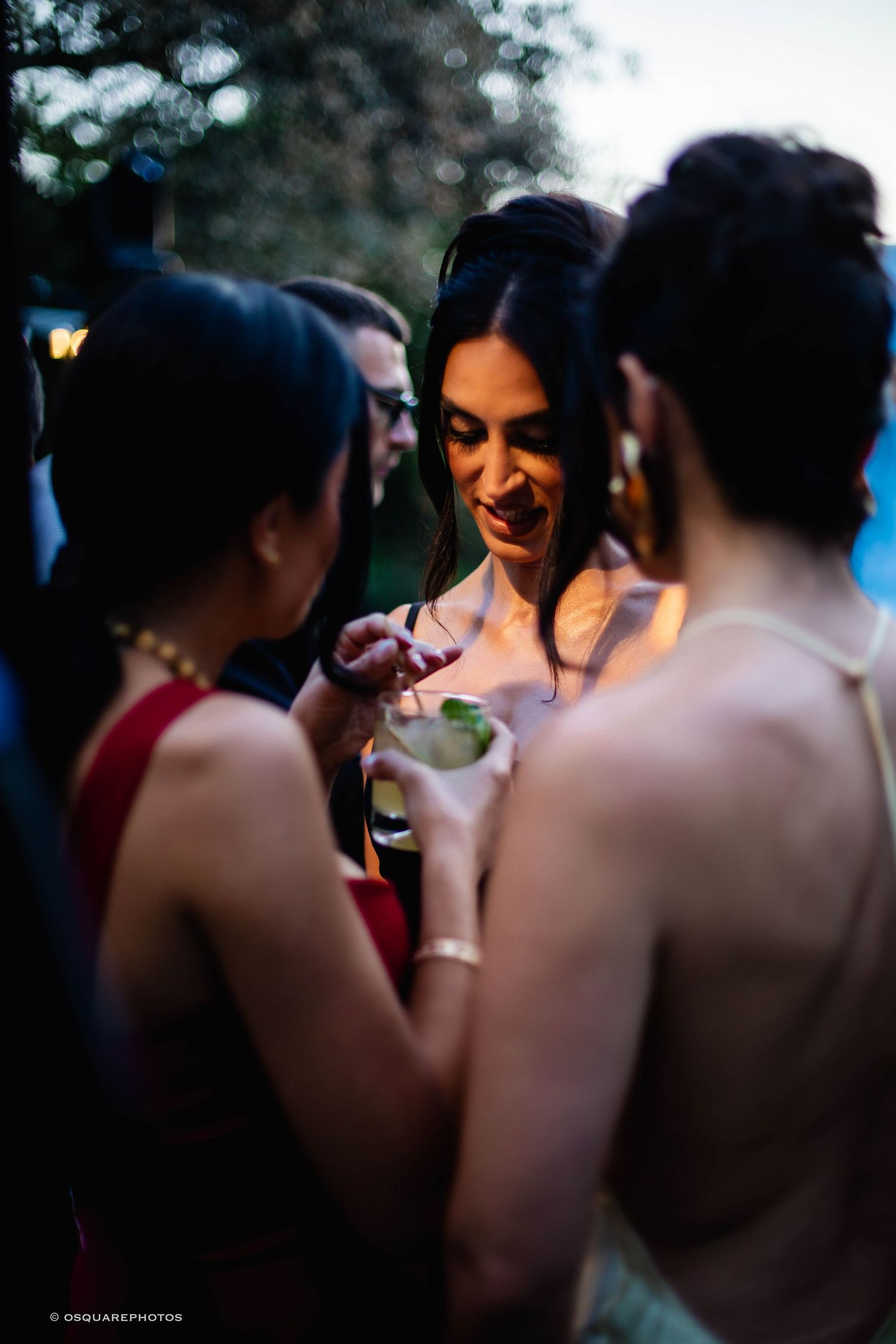 A sequence of candid wedding party moments captured in soft focus during an outdoor evening celebration.