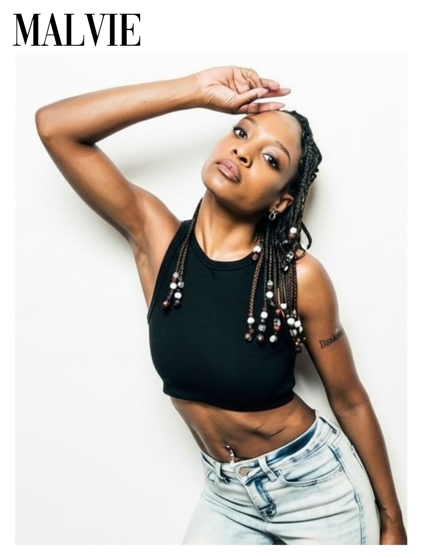Editorial portrait of Genesis Dudley featured in MALVIE Magazine.