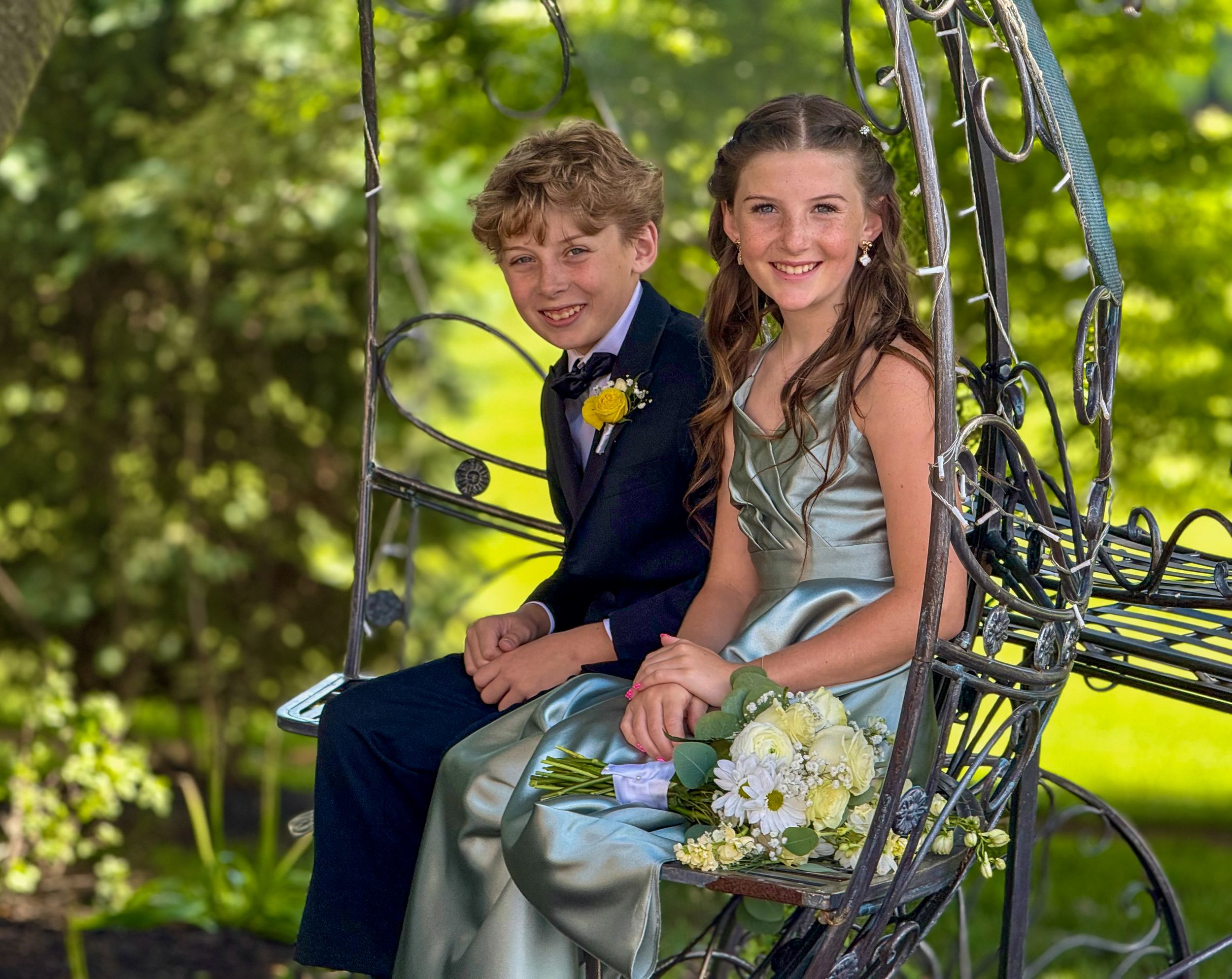 Children wait for a wedding to start.