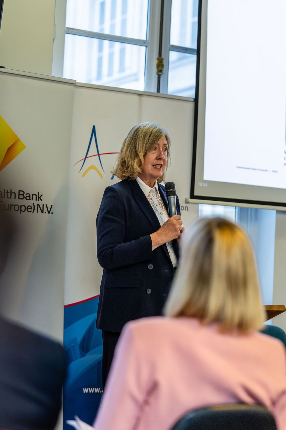 Speaker addressing guests at AFBA Commonwealth Bank of Australia event, Paris - parisianphotographers.com