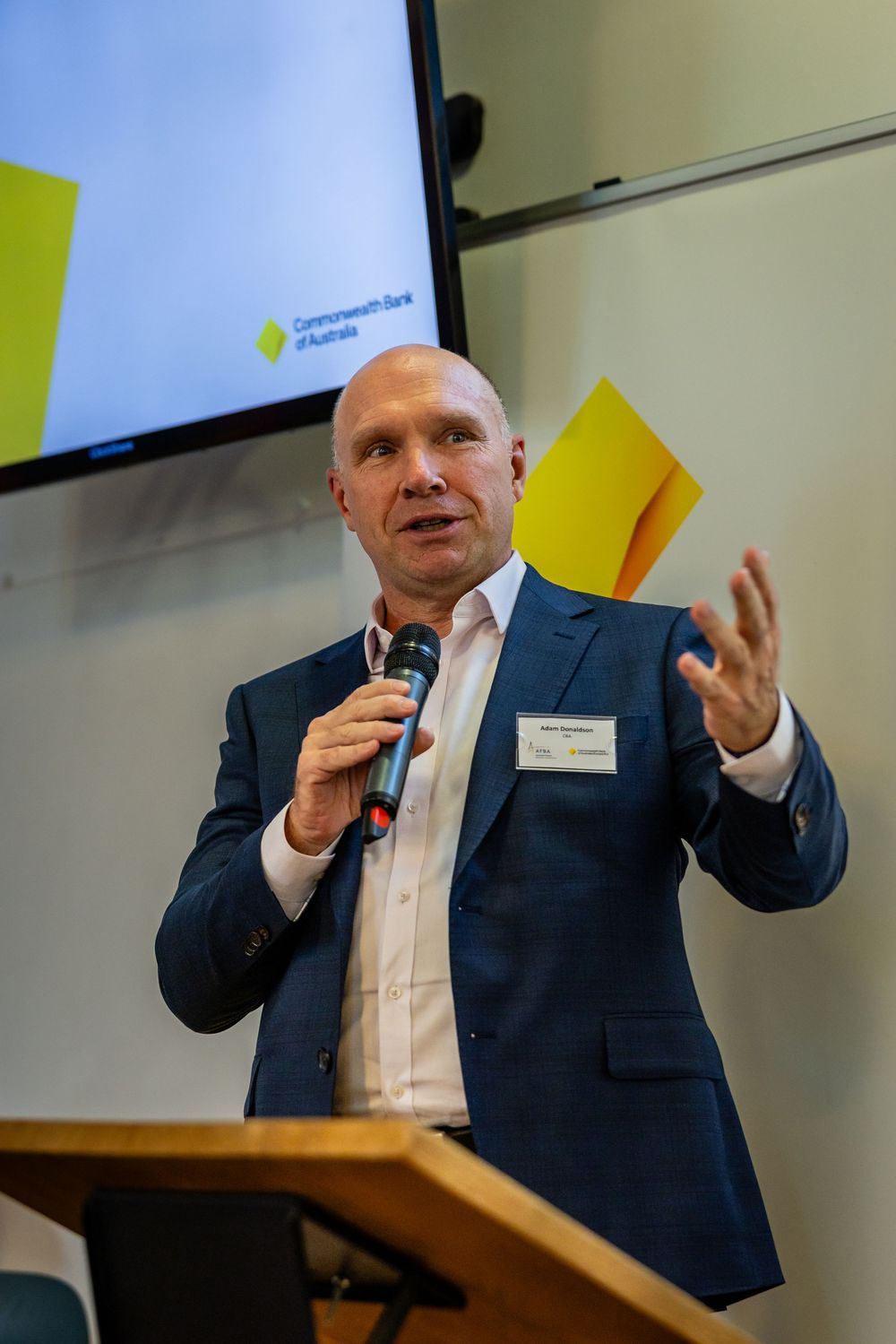 Panel speaker at podium, AFBA Commonwealth Bank of Australia event, Paris - parisianphotographers.com