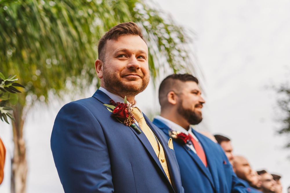 Channel Side Club in Palm Coast Florida. Wedding photography of outdoor ceremony. Groom views his bride.