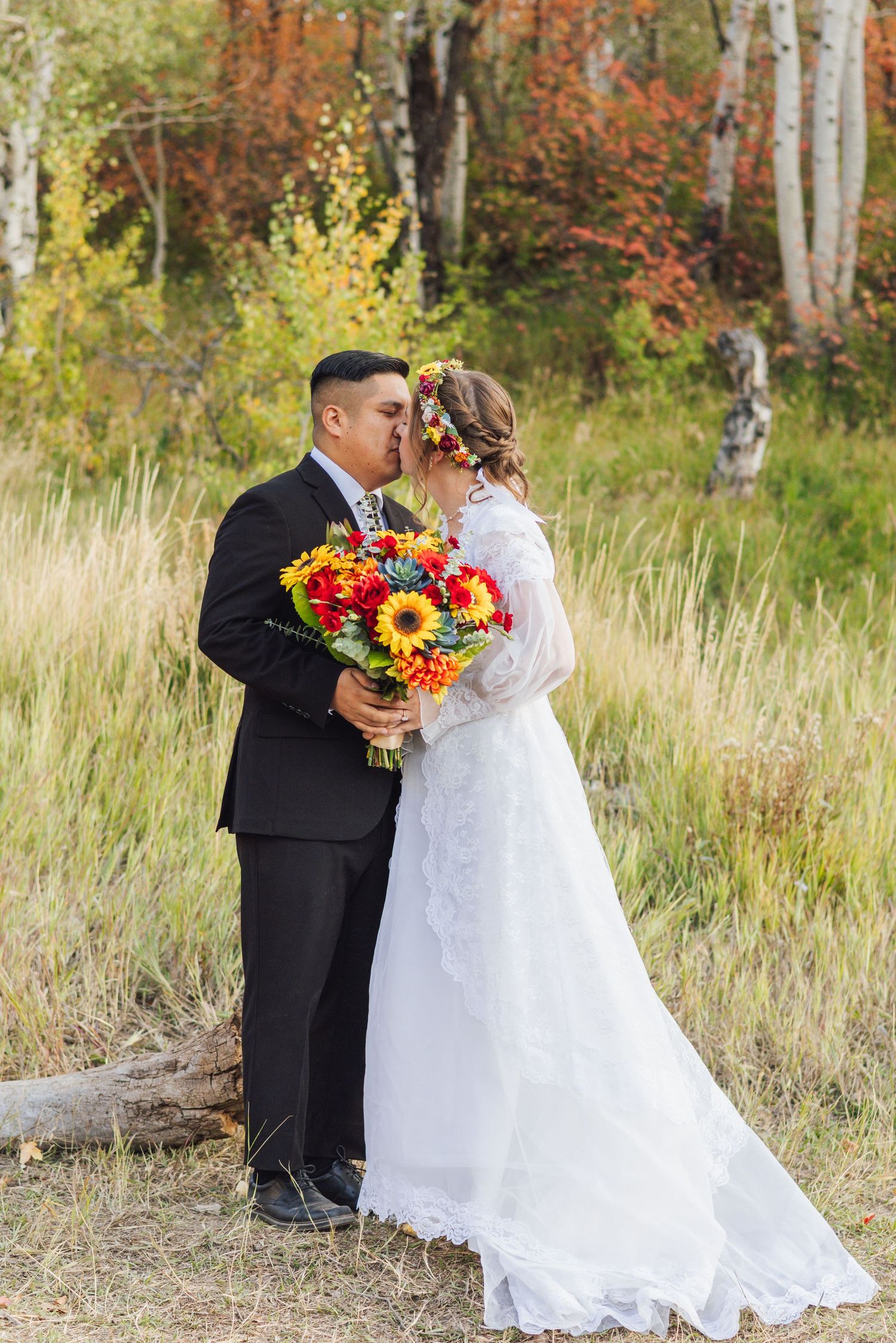 First look for bride and groom spinning in front of the Brigham City Utah LDS temple